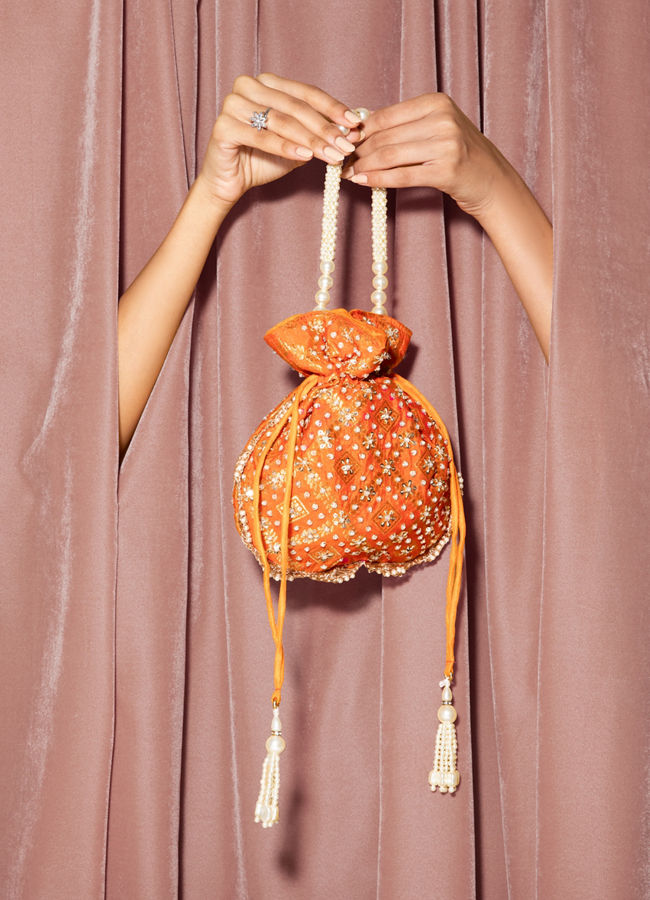 Mohey Women Vibrant Orange Potli Bag