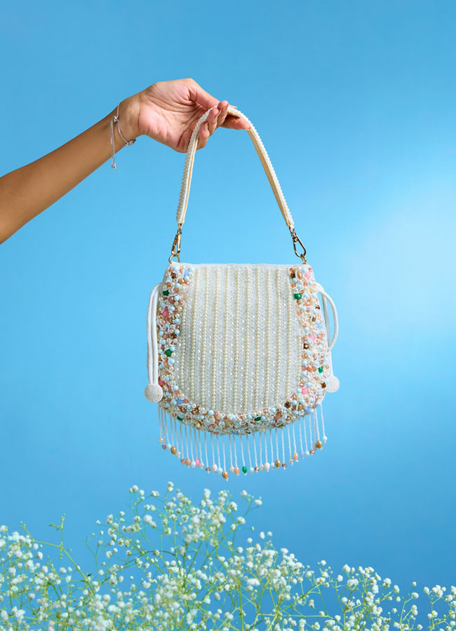 Mohey Women Charmful Cream Tussar Silk Potli Bag