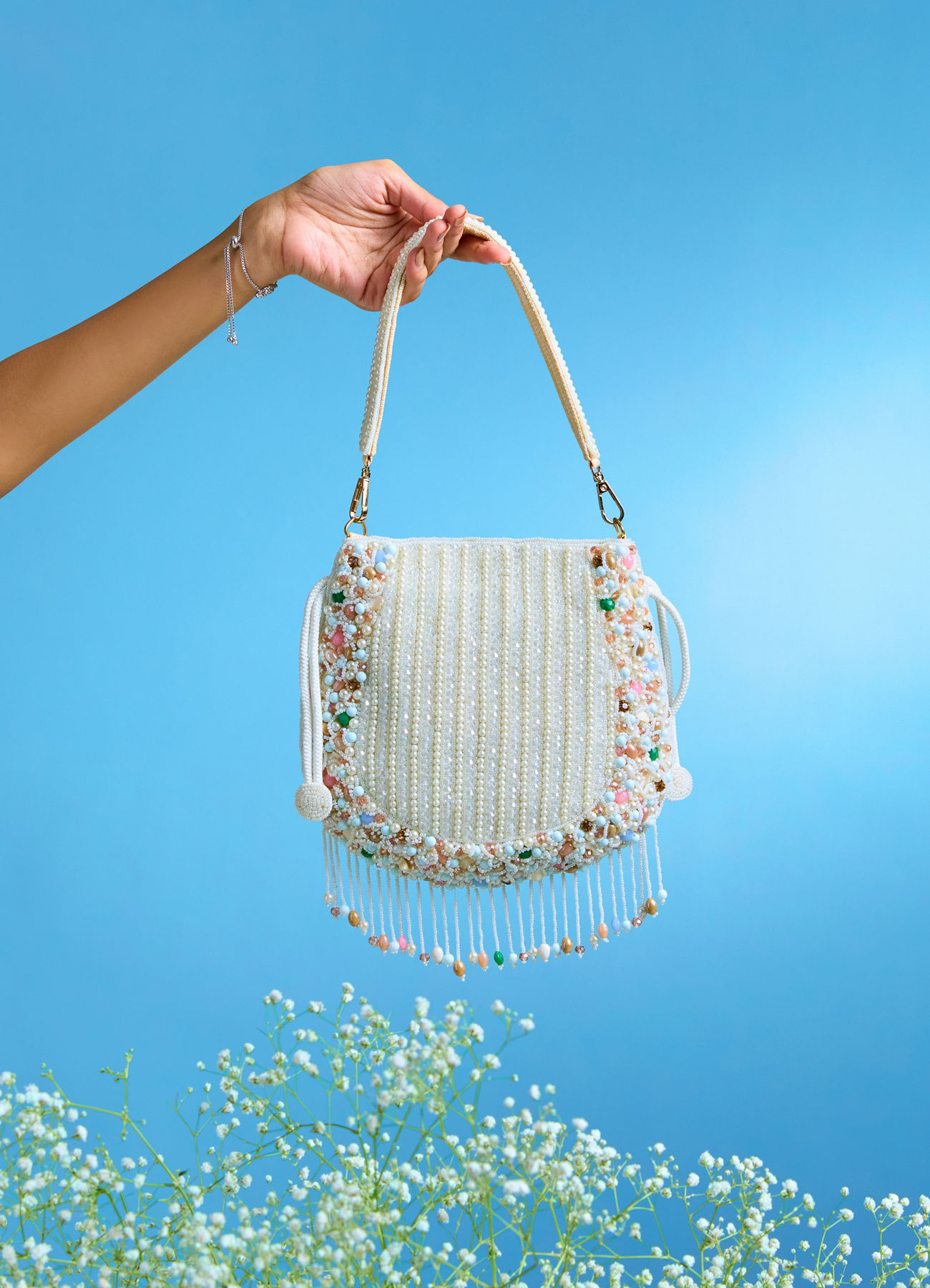 Mohey Women Charmful Cream Tussar Silk Potli Bag