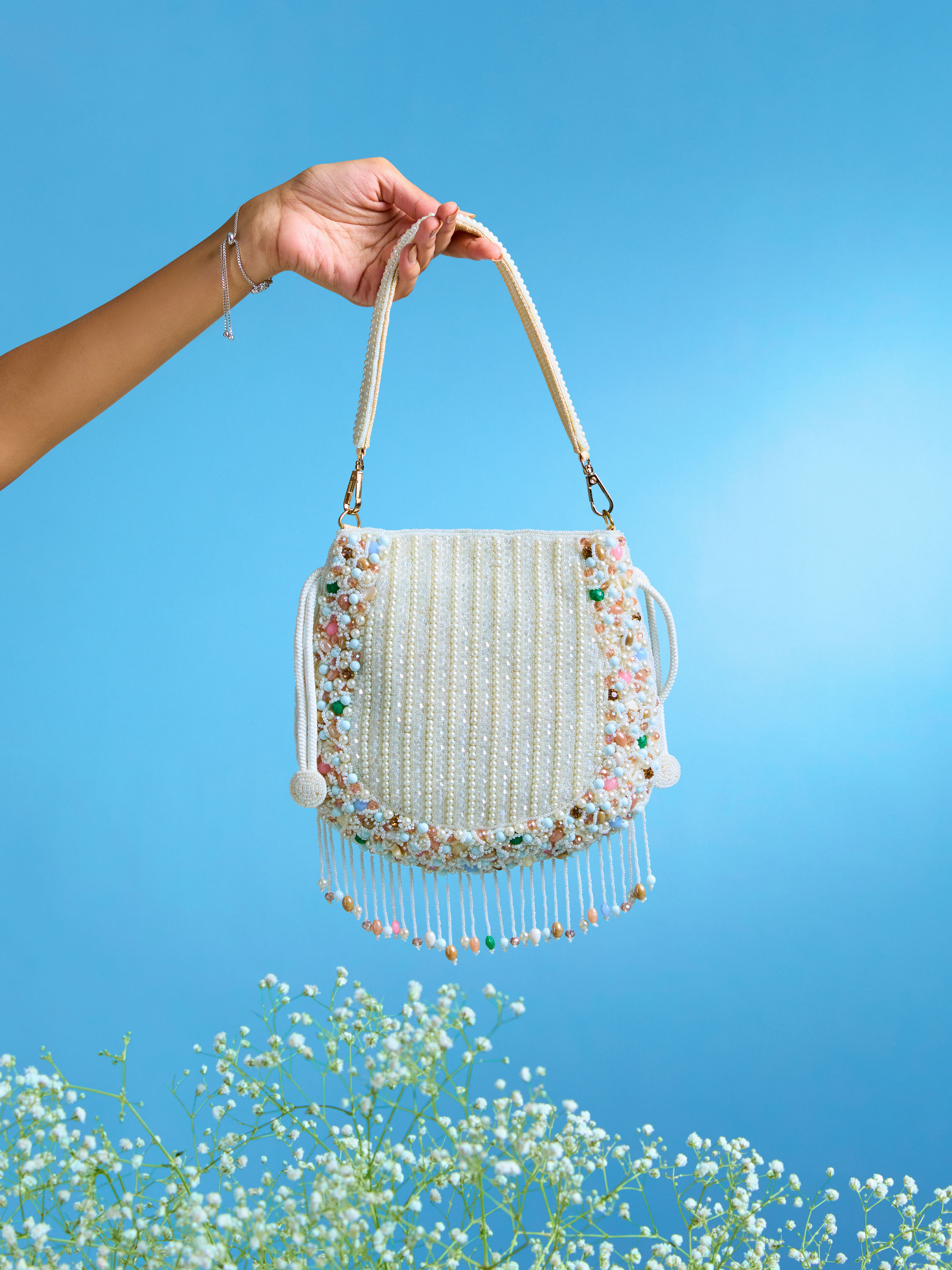 Mohey Women Charmful Cream Tussar Silk Potli Bag