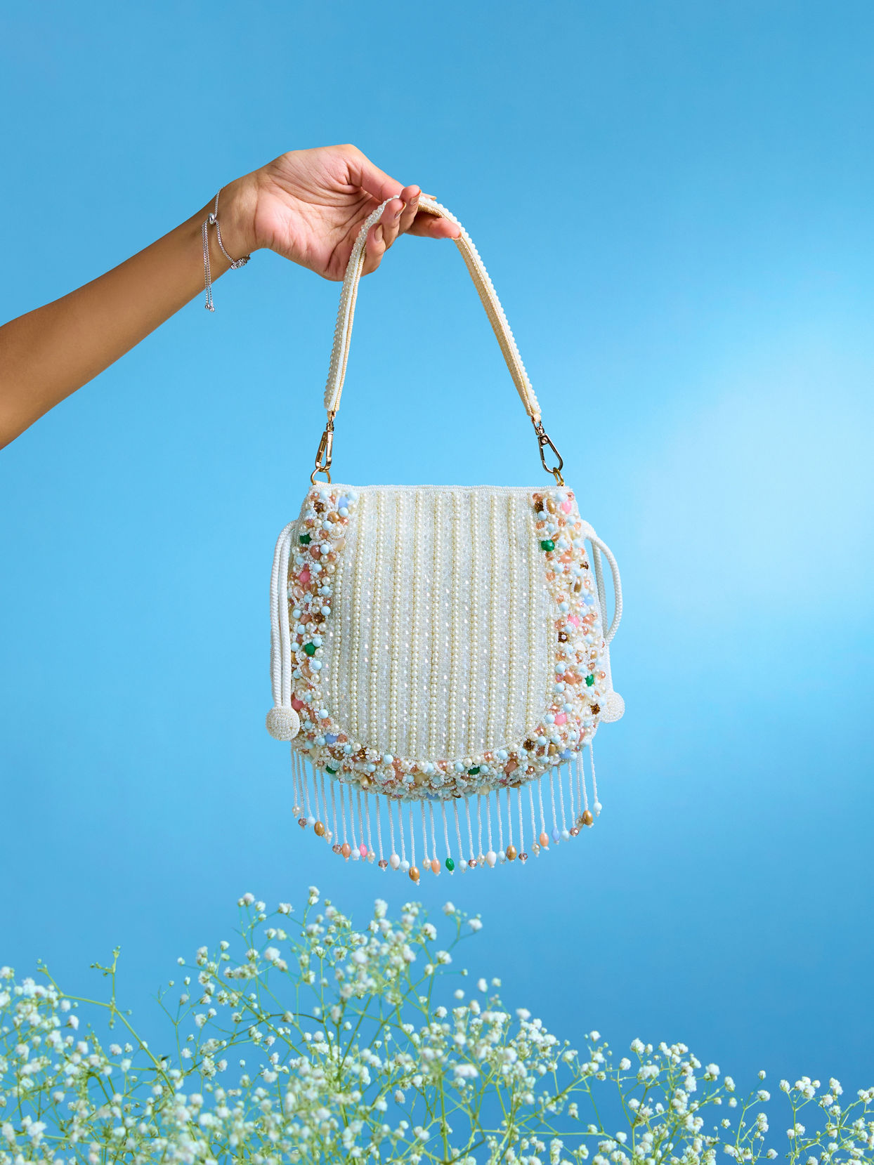 Mohey Women Charmful Cream Tussar Silk Potli Bag