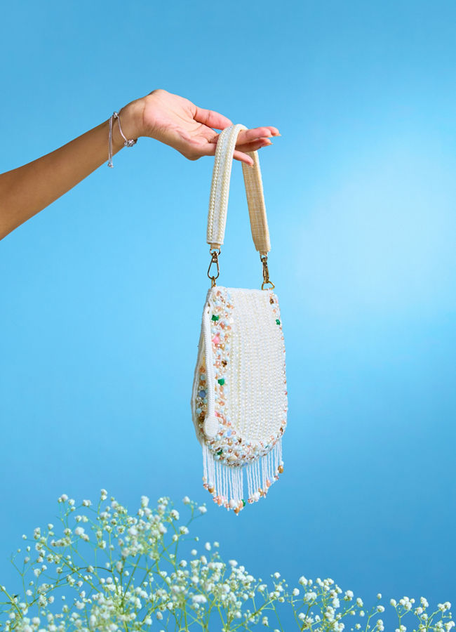 Mohey Women Charmful Cream Tussar Silk Potli Bag