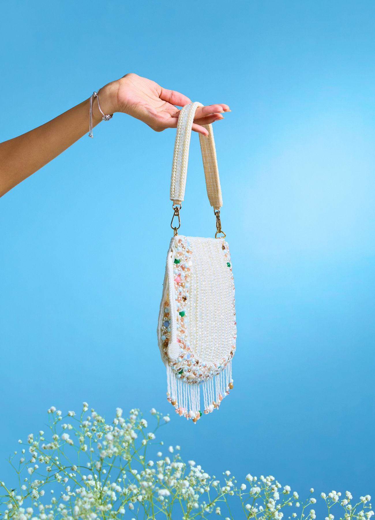 Mohey Women Charmful Cream Tussar Silk Potli Bag
