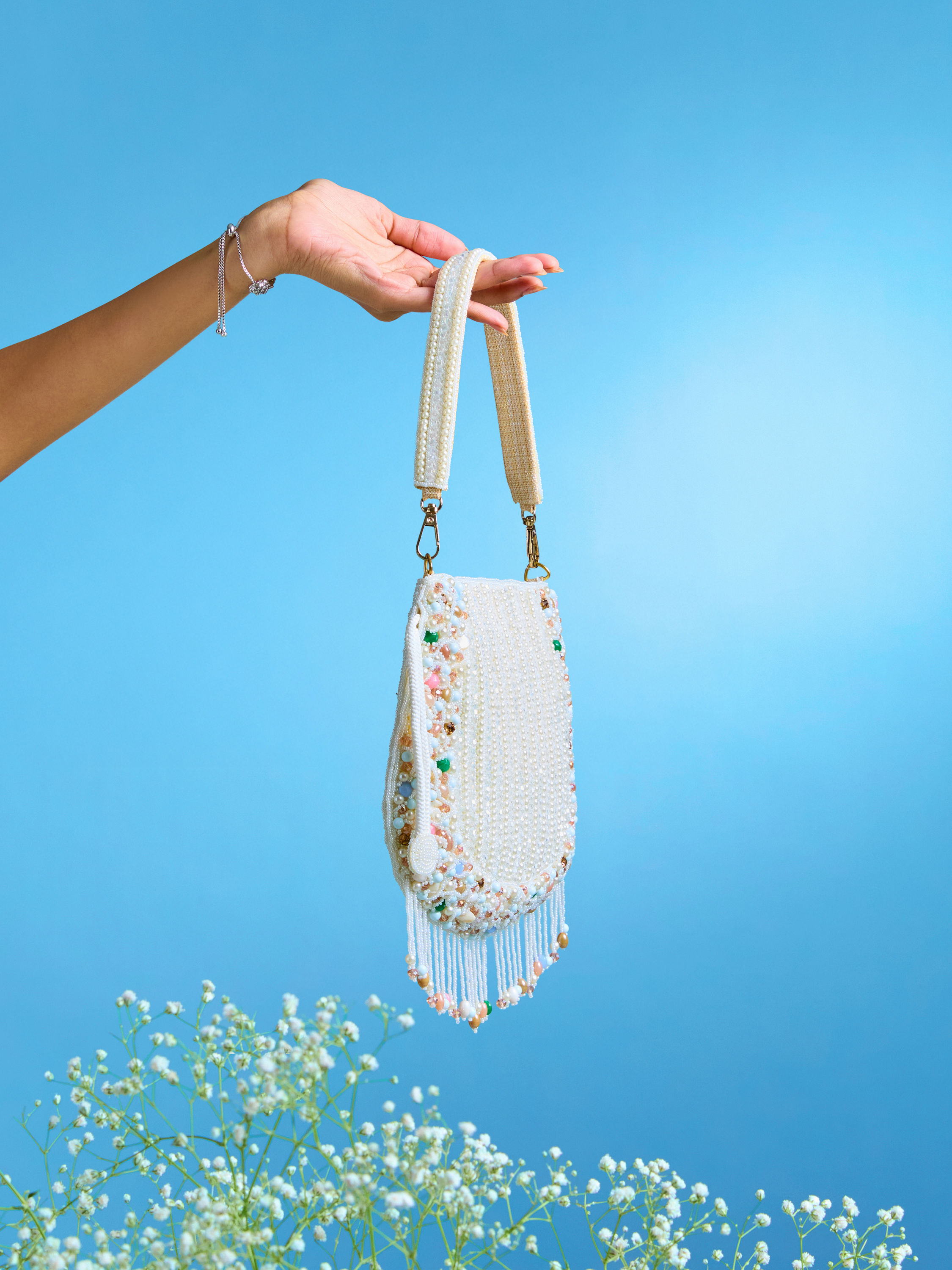 Mohey Women Charmful Cream Tussar Silk Potli Bag