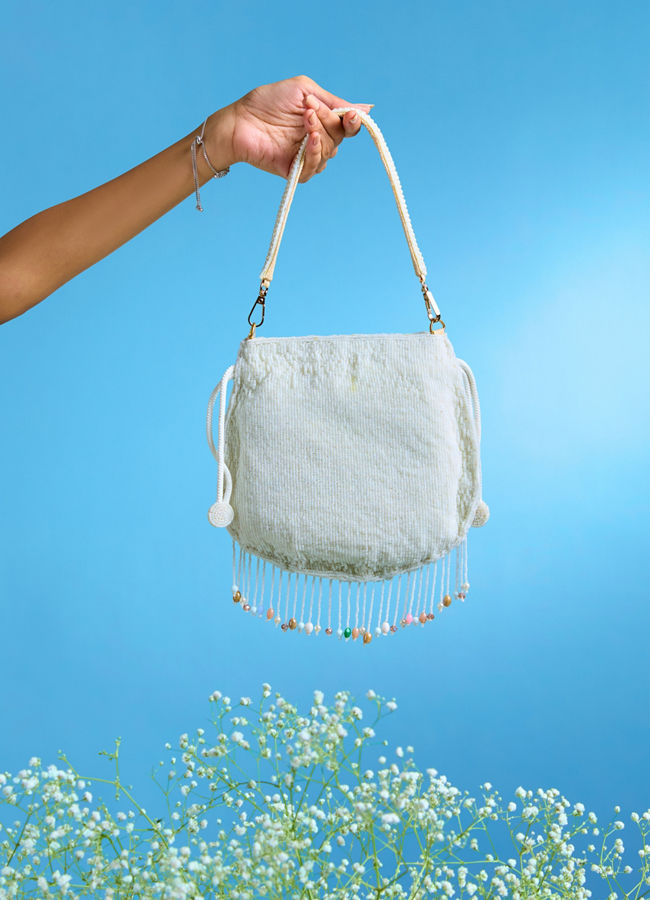 Mohey Women Charmful Cream Tussar Silk Potli Bag