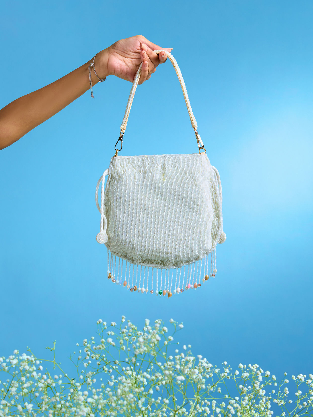 Mohey Women Charmful Cream Tussar Silk Potli Bag