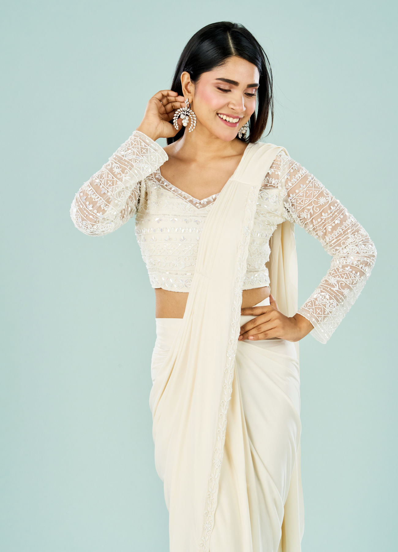 Mohey Women Cream Hued Pre Draped Saree Ensemble
