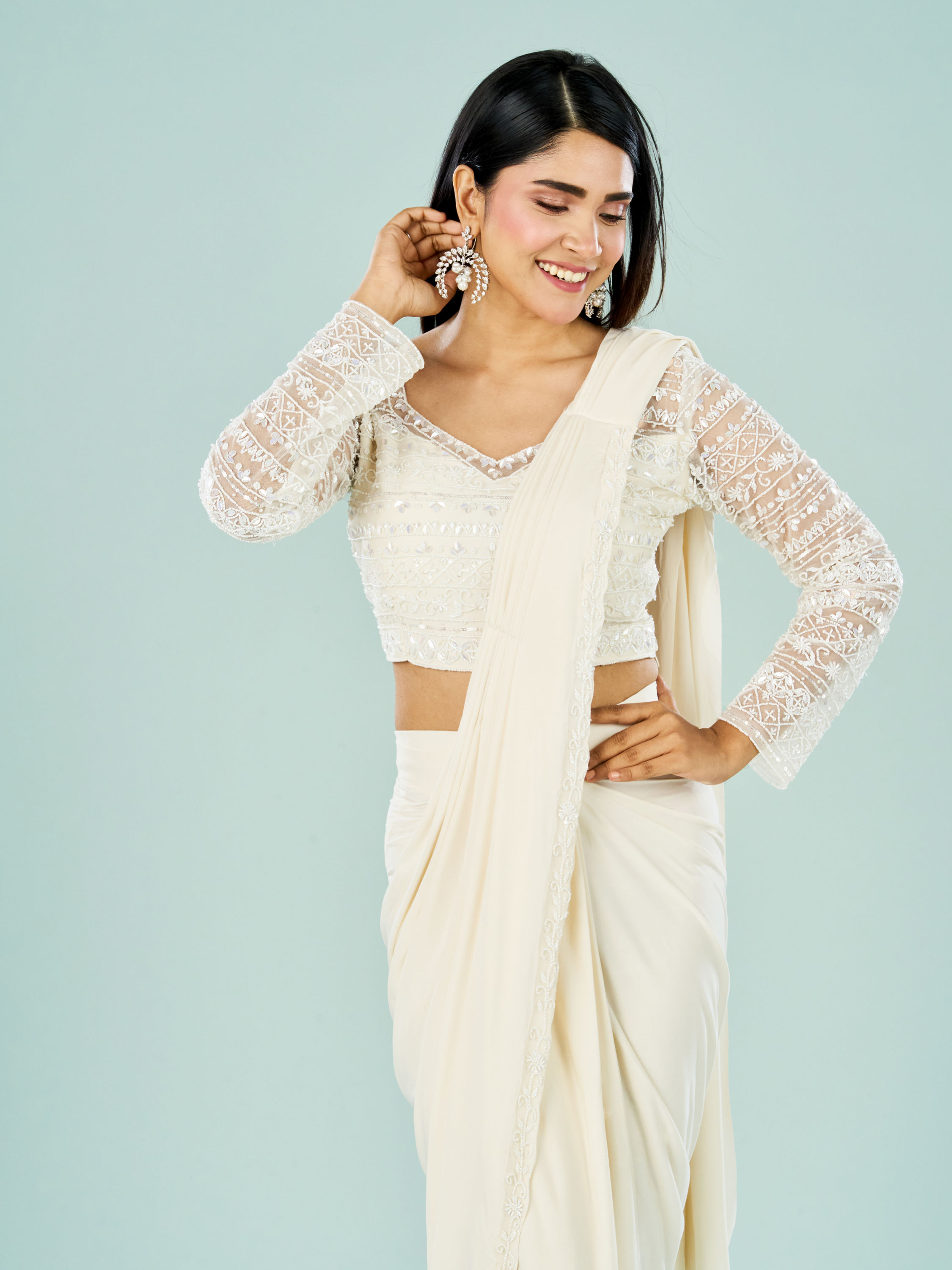Mohey Women Cream Hued Pre Draped Saree Ensemble