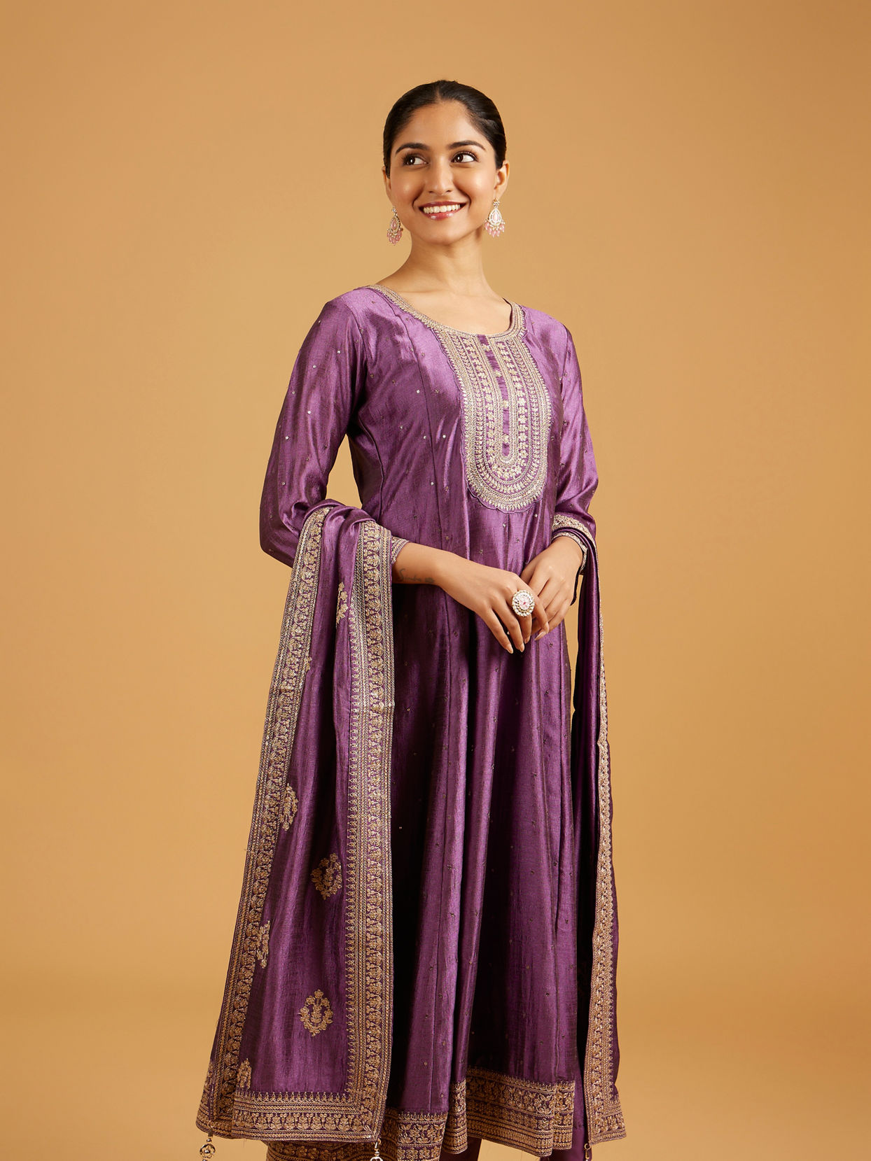 Mohey Women Dewberry Purple Rhinestone Anarkali Suit with Zari Border And Neckline