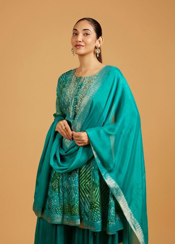 Mohey Women Rama Green Bandhani Print Palazzo Suit with Embroidered Neckline