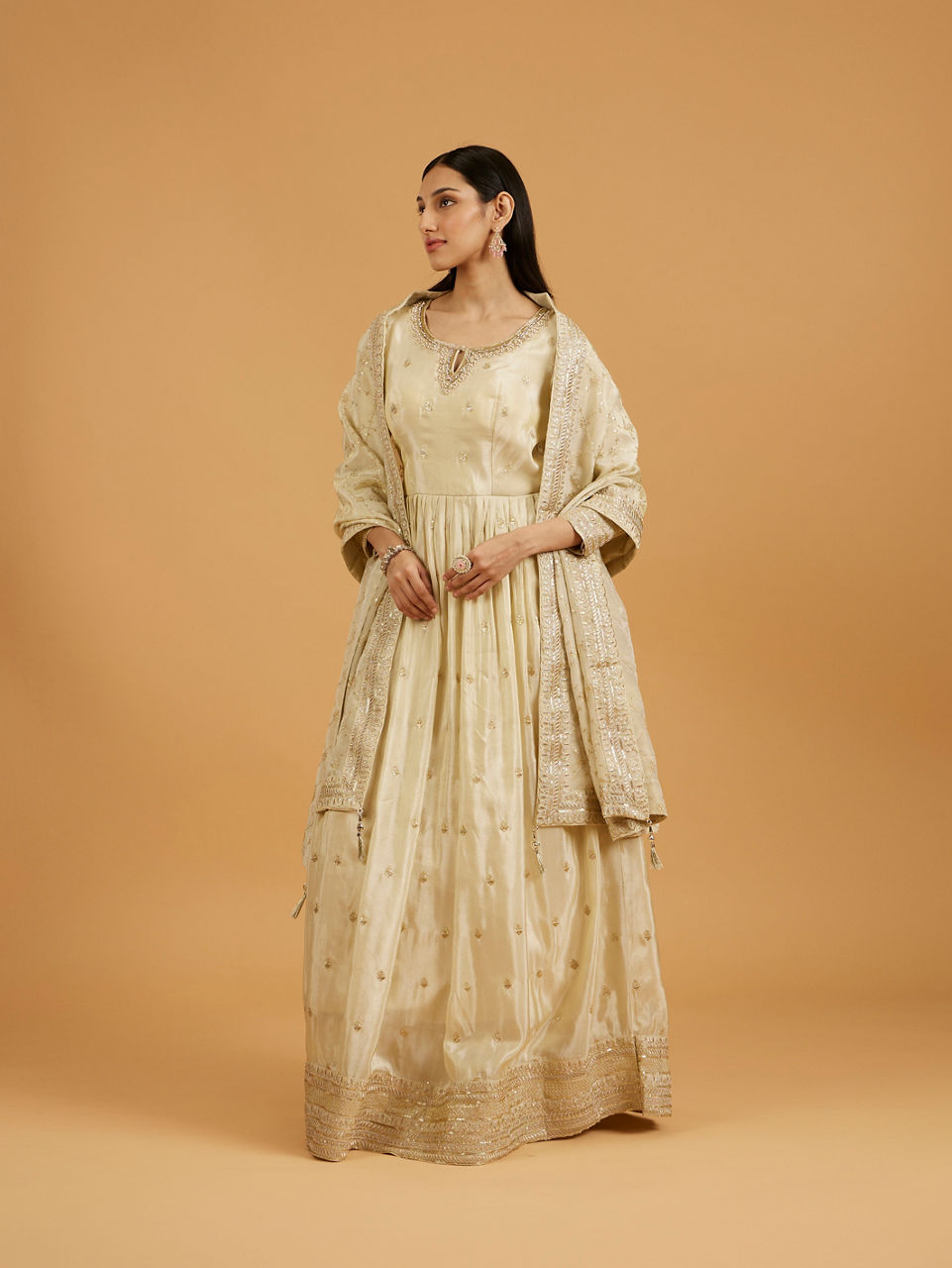 Mohey Women Soft Cream Buta Patterned Anarkali Suit with Zari And Sequin Work