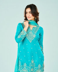 Mohey Women Rama Green Chinon Sharara Suit
