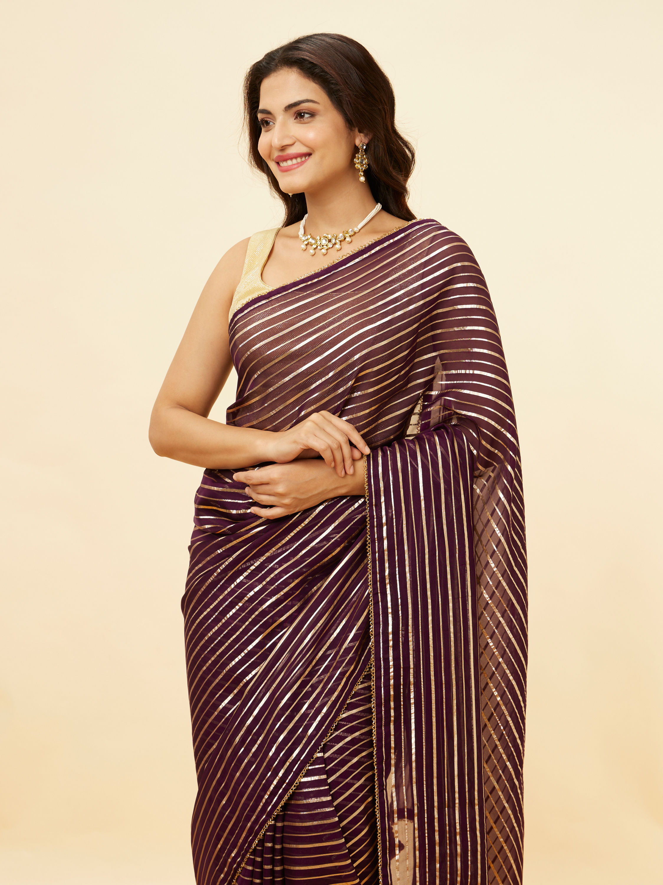 Mohey Women Jamun Purple Gota Patti Striped Saree