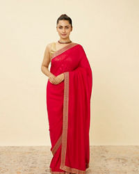 alt message - Mohey Women Fiesta Red Saree with Geometrical Patterned Borders image number 0