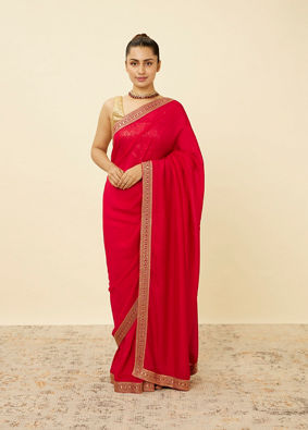 alt message - Mohey Women Fiesta Red Saree with Geometrical Patterned Borders image number 0