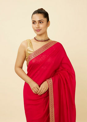 alt message - Mohey Women Fiesta Red Saree with Geometrical Patterned Borders image number 1