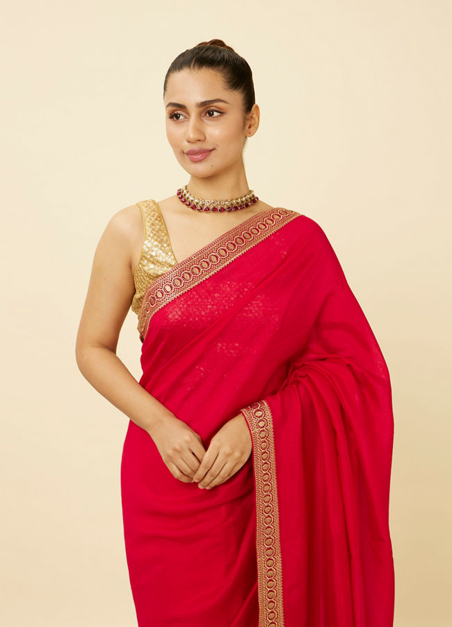 alt message - Mohey Women Fiesta Red Saree with Geometrical Patterned Borders image number 1