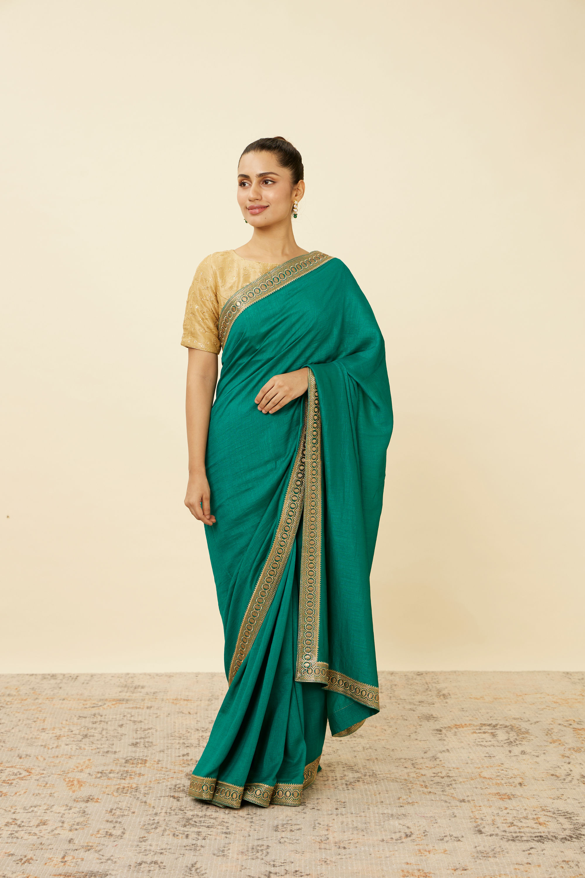 Mohey Women Teal Green Saree with Geometrical Patterned Borders