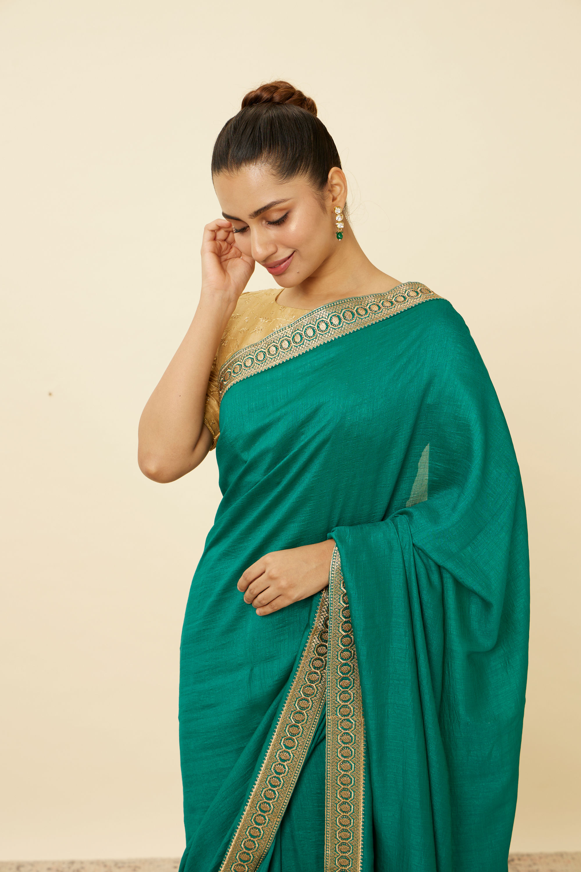 Mohey Women Teal Green Saree with Geometrical Patterned Borders