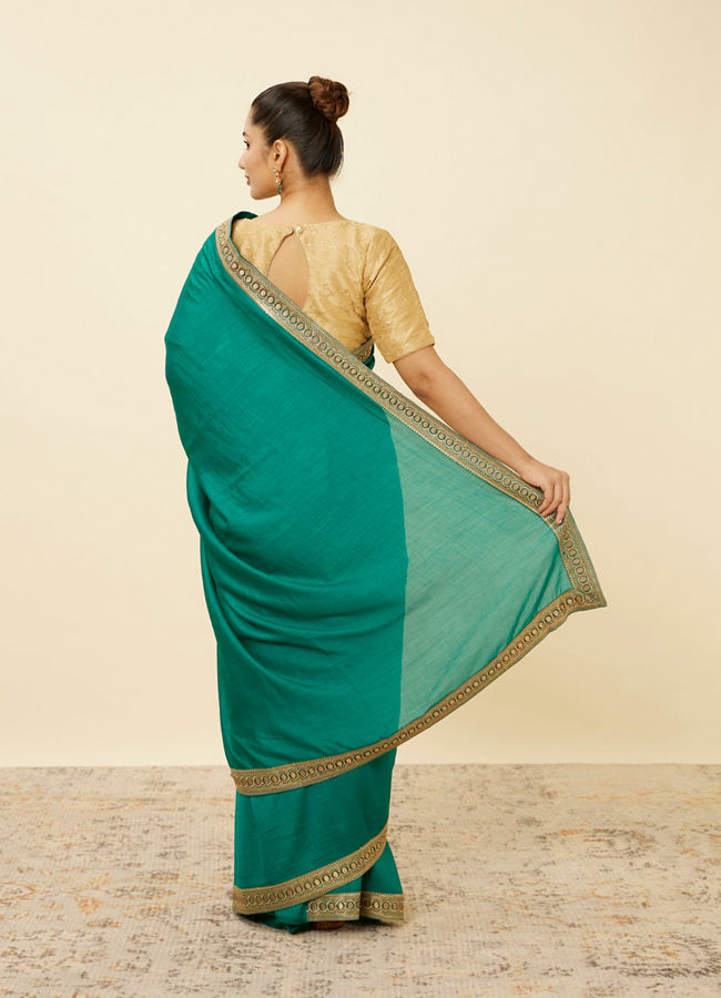 Mohey Women Teal Green Saree with Geometrical Patterned Borders