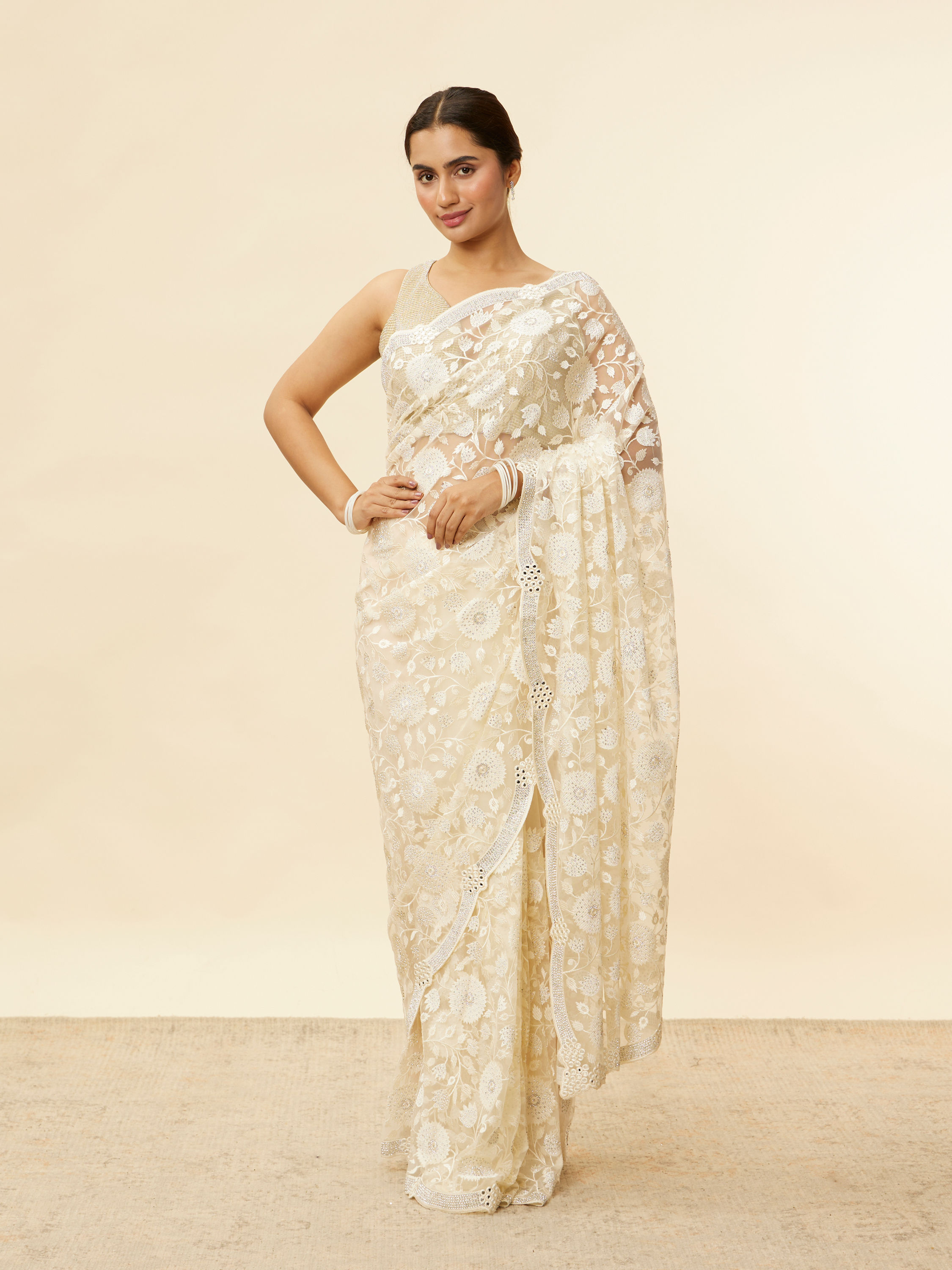 Mohey Women Ivory Cream Bel Buti Patterned Mirror and Stone Work Saree