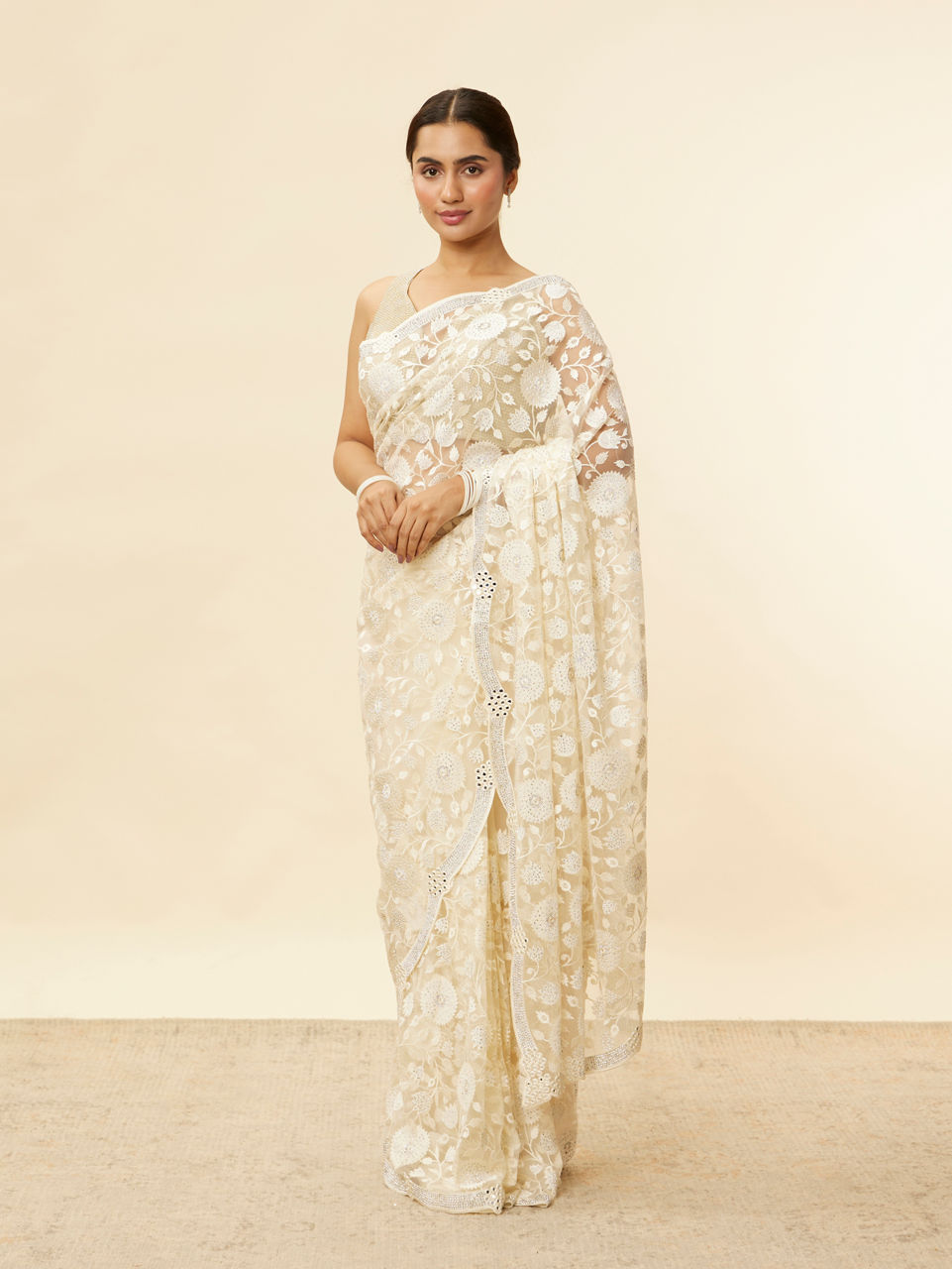 Mohey Women Ivory Cream Bel Buti Patterned Mirror and Stone Work Saree