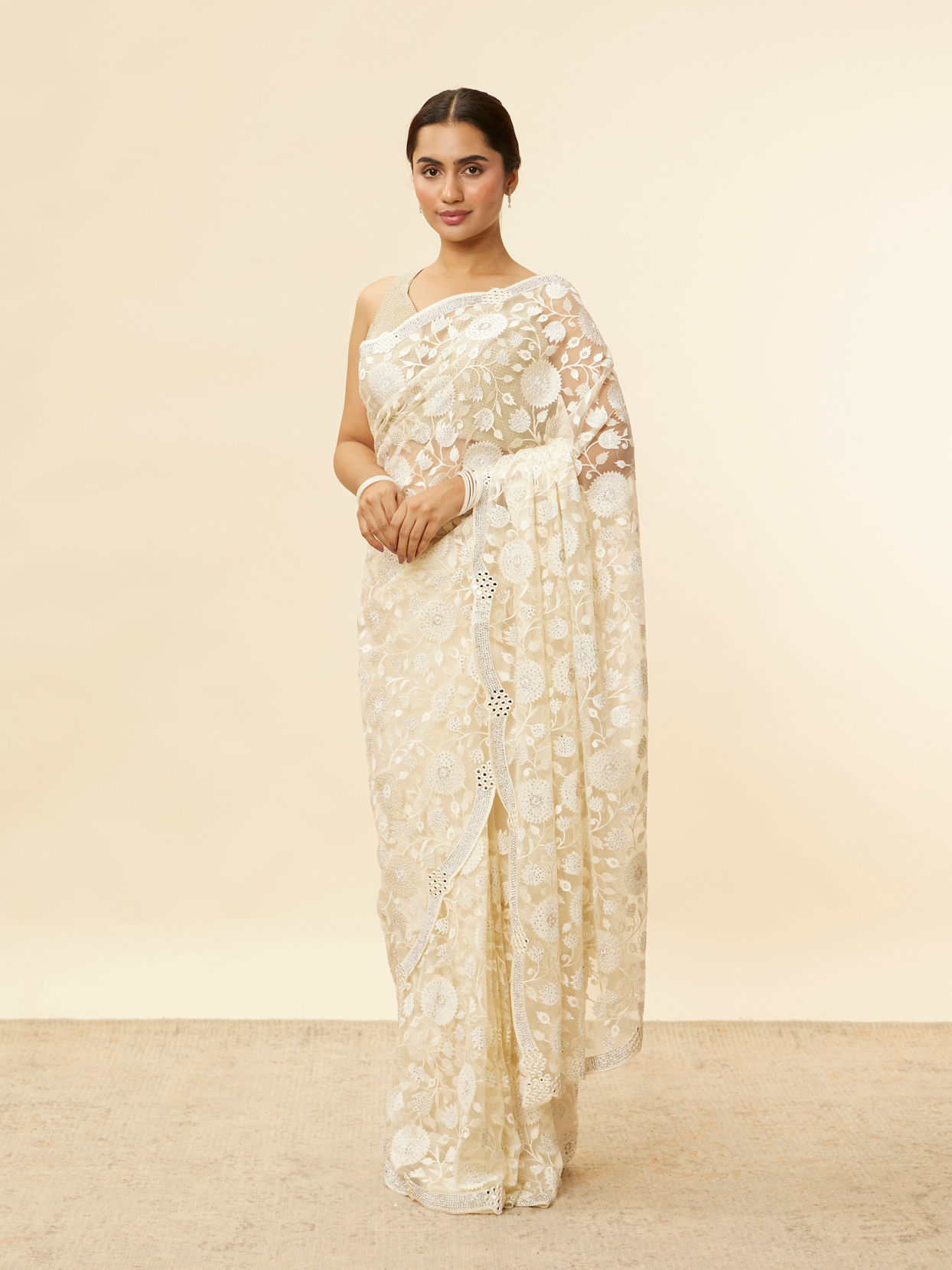 Mohey Women Ivory Cream Bel Buti Patterned Mirror and Stone Work Saree