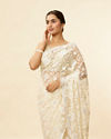 alt message - Mohey Women Ivory Cream Bel Buti Patterned Mirror and Stone Work Saree image number 1