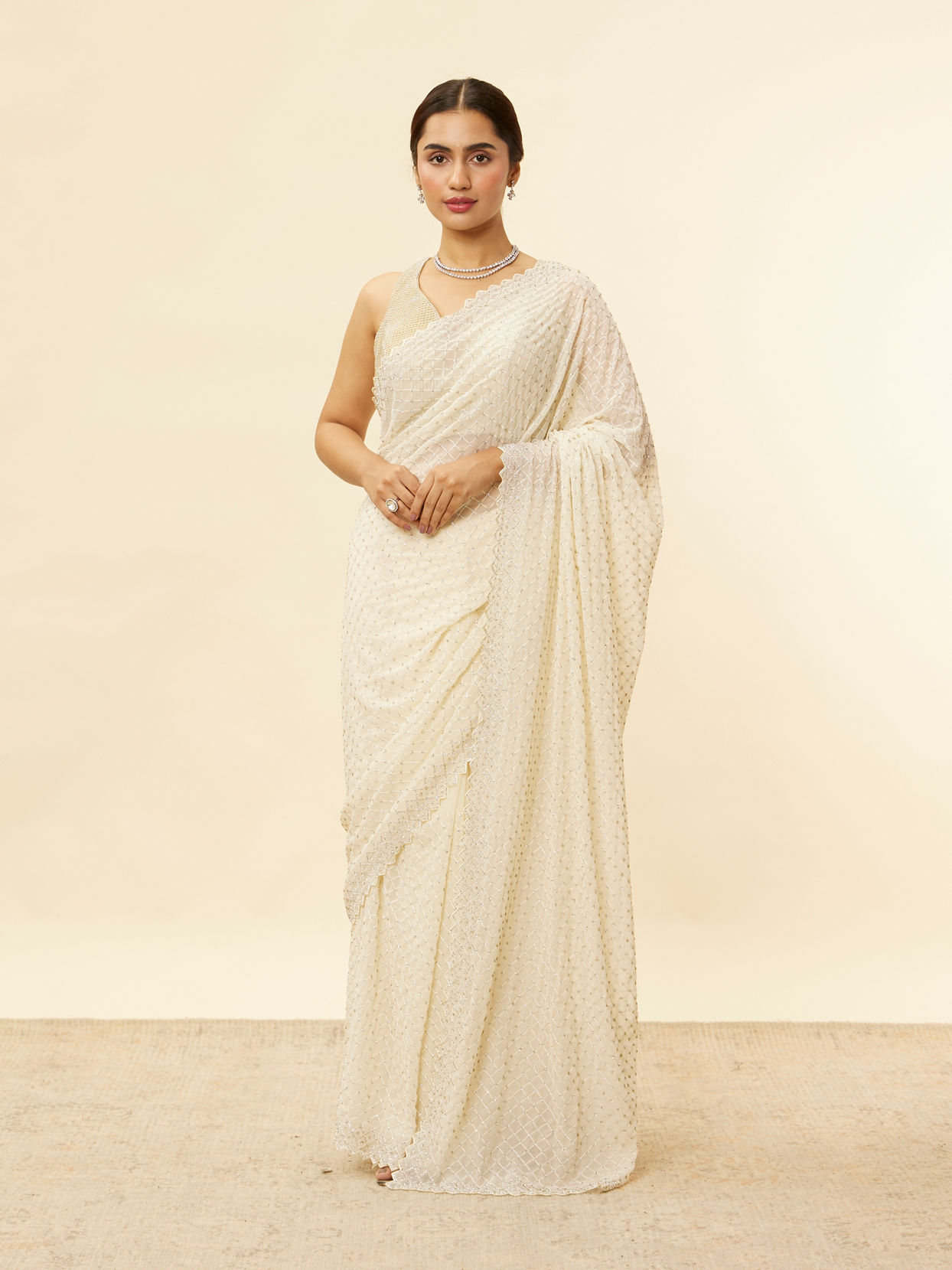 alt message - Mohey Women Ivory White Lattice Patterned Stone Work Saree image number 0