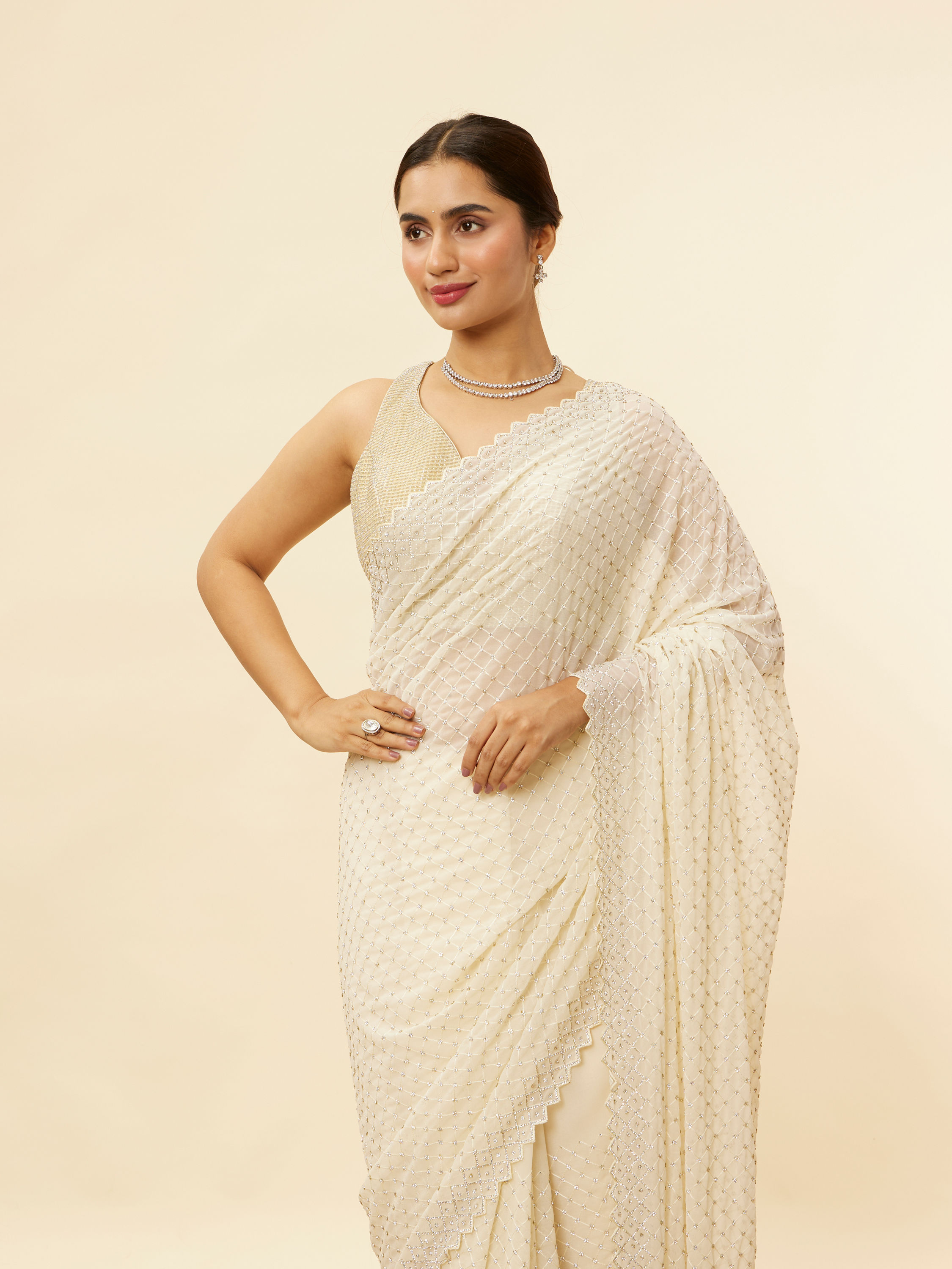 Mohey Women Ivory White Lattice Patterned Stone Work Saree