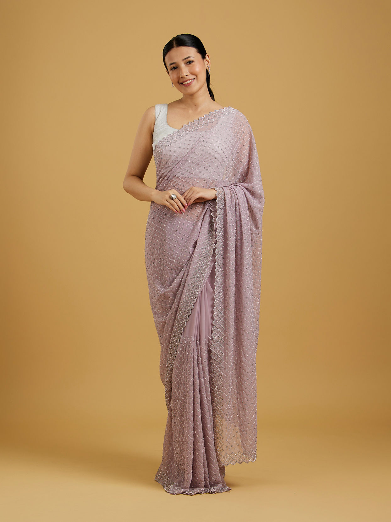 alt message - Mohey Women Dazzling Purple Georgette Saree image number 0