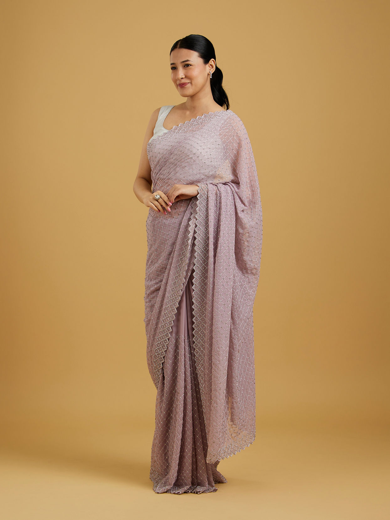 Mohey Women Dazzling Purple Georgette Saree