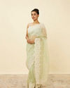 alt message - Mohey Women Pistachio Green Saree with Floral Vine Patterned Borders image number 3