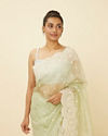 alt message - Mohey Women Pistachio Green Saree with Floral Vine Patterned Borders image number 1