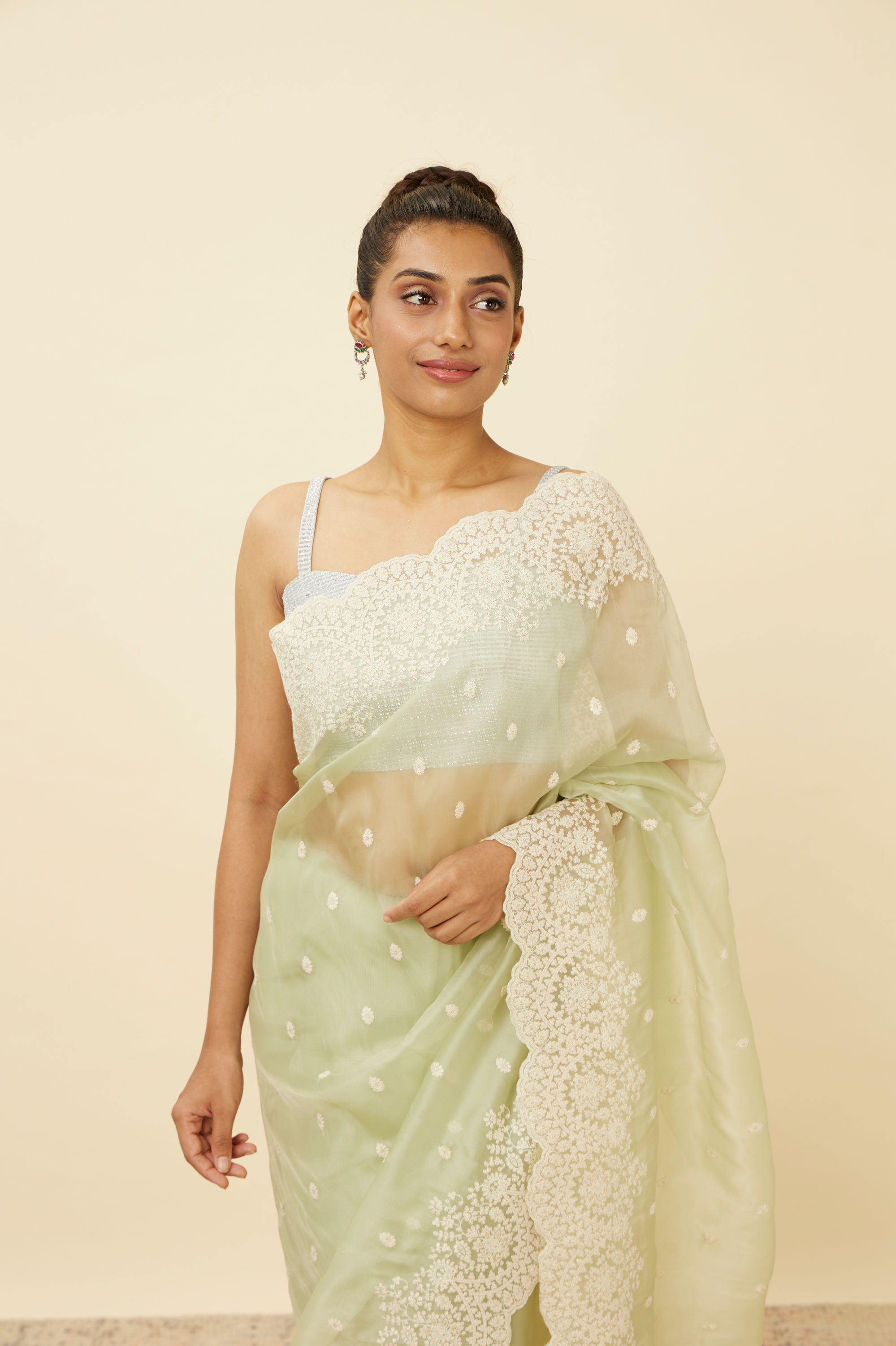 Mohey Women Pistachio Green Saree with Floral Vine Patterned Borders