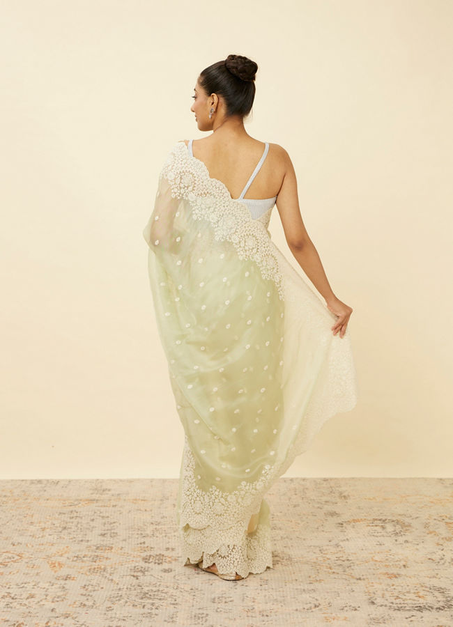 alt message - Mohey Women Pistachio Green Saree with Floral Vine Patterned Borders image number 2