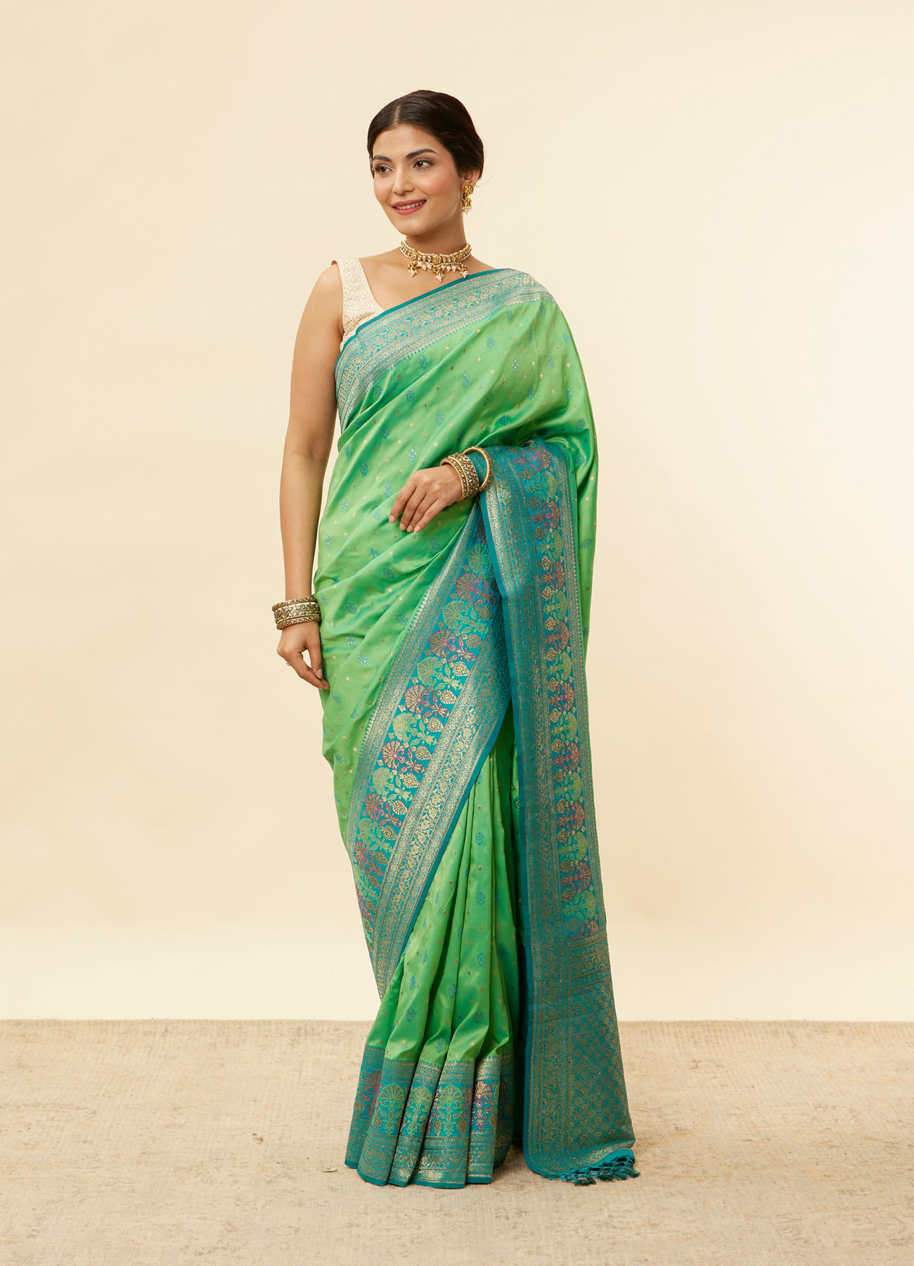 Mohey Women Emerald Green Zari and Stone Work Saree