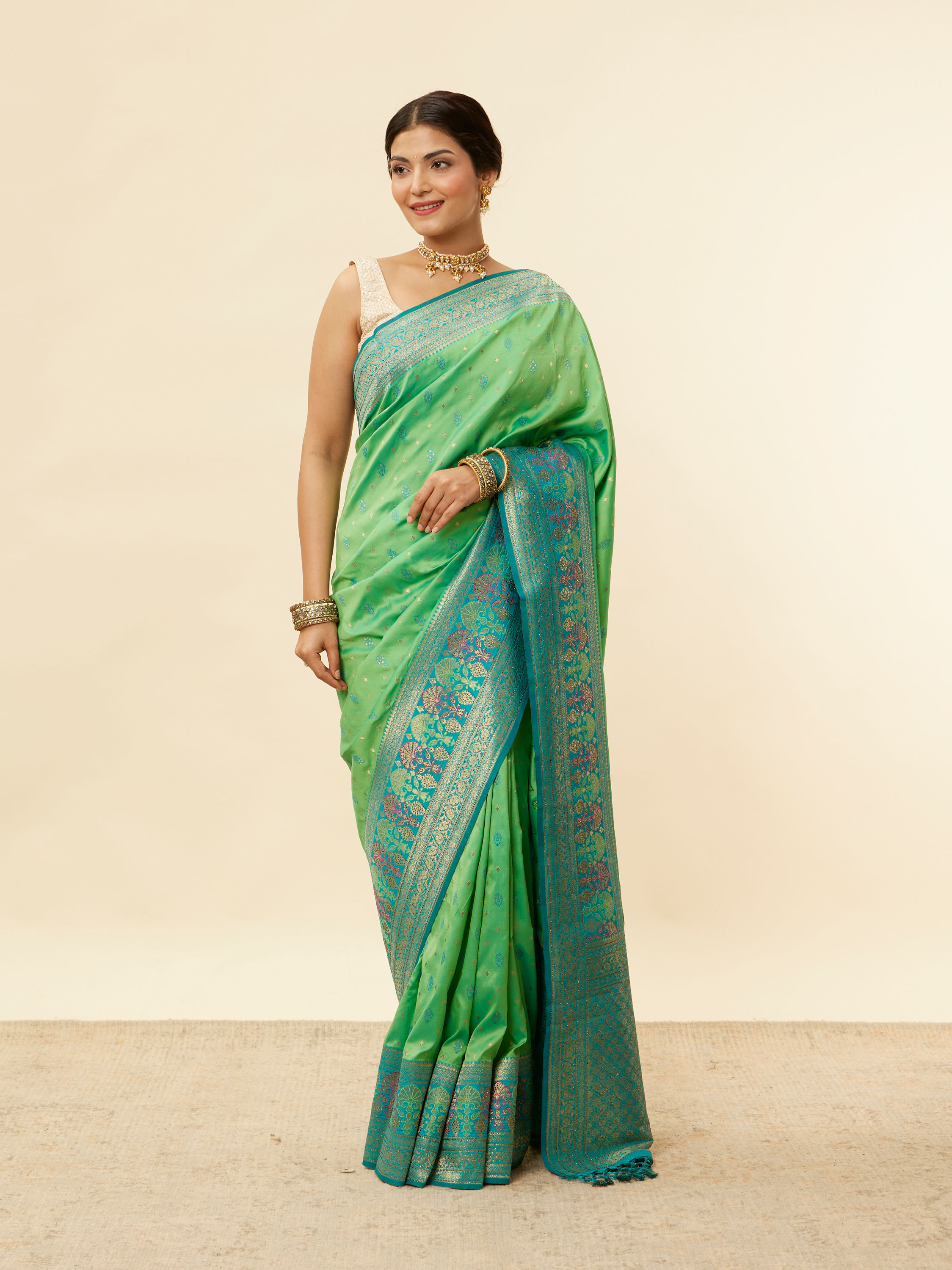 Mohey Women Emerald Green Zari and Stone Work Saree