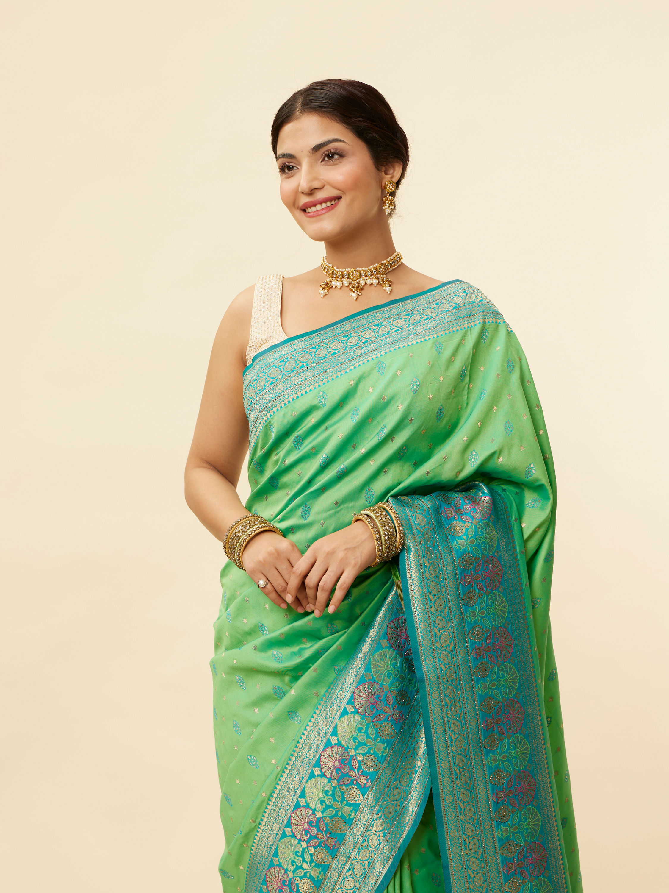 Mohey Women Emerald Green Zari and Stone Work Saree