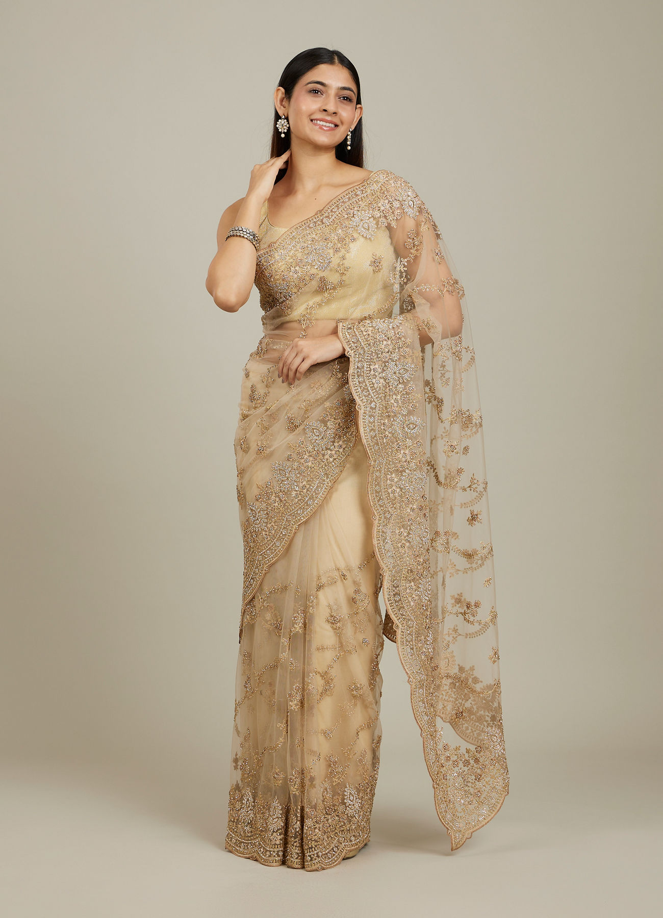 Mohey Women Warm Beige Bel Buti Patterned Stone Work Saree