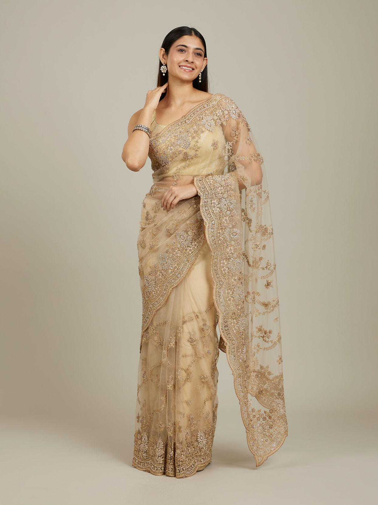 Mohey Women Warm Beige Bel Buti Patterned Stone Work Saree image number 0