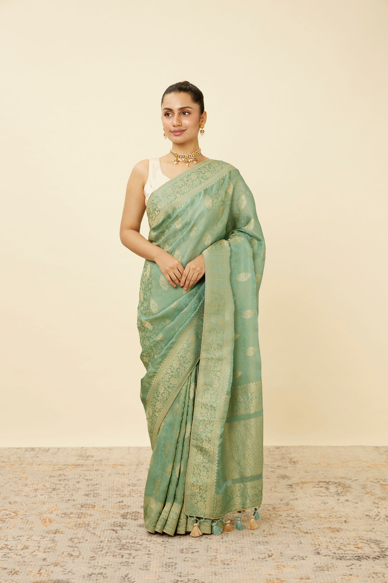 Mohey Women Pastel Turquoise Saree with Floral Medallion Patterns