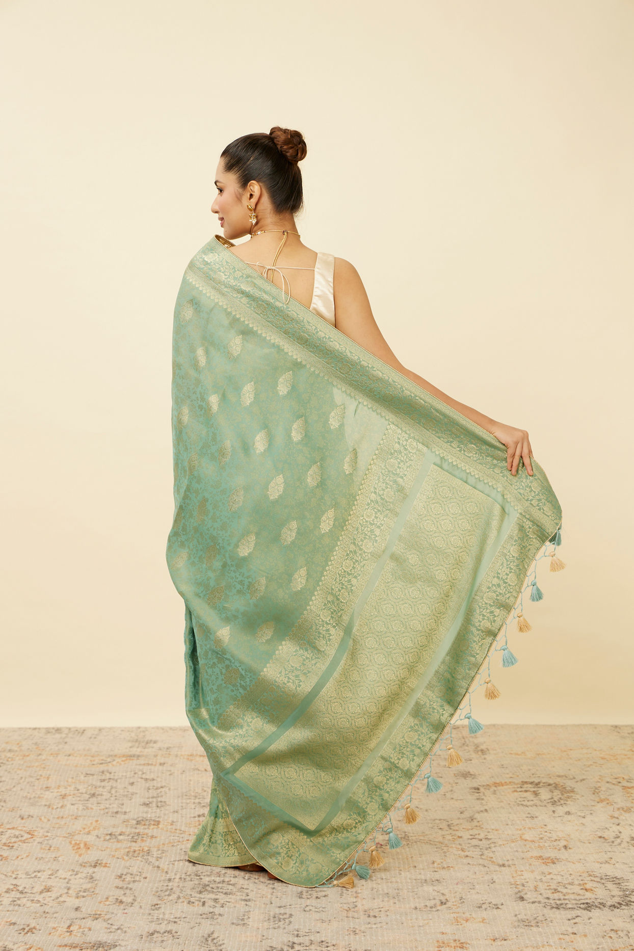 Mohey Women Pastel Turquoise Saree with Floral Medallion Patterns