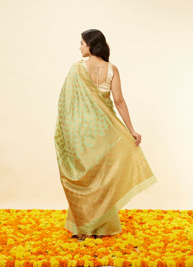 alt message - Mohey Women Pista Green Floral Zari Work Saree image number 2