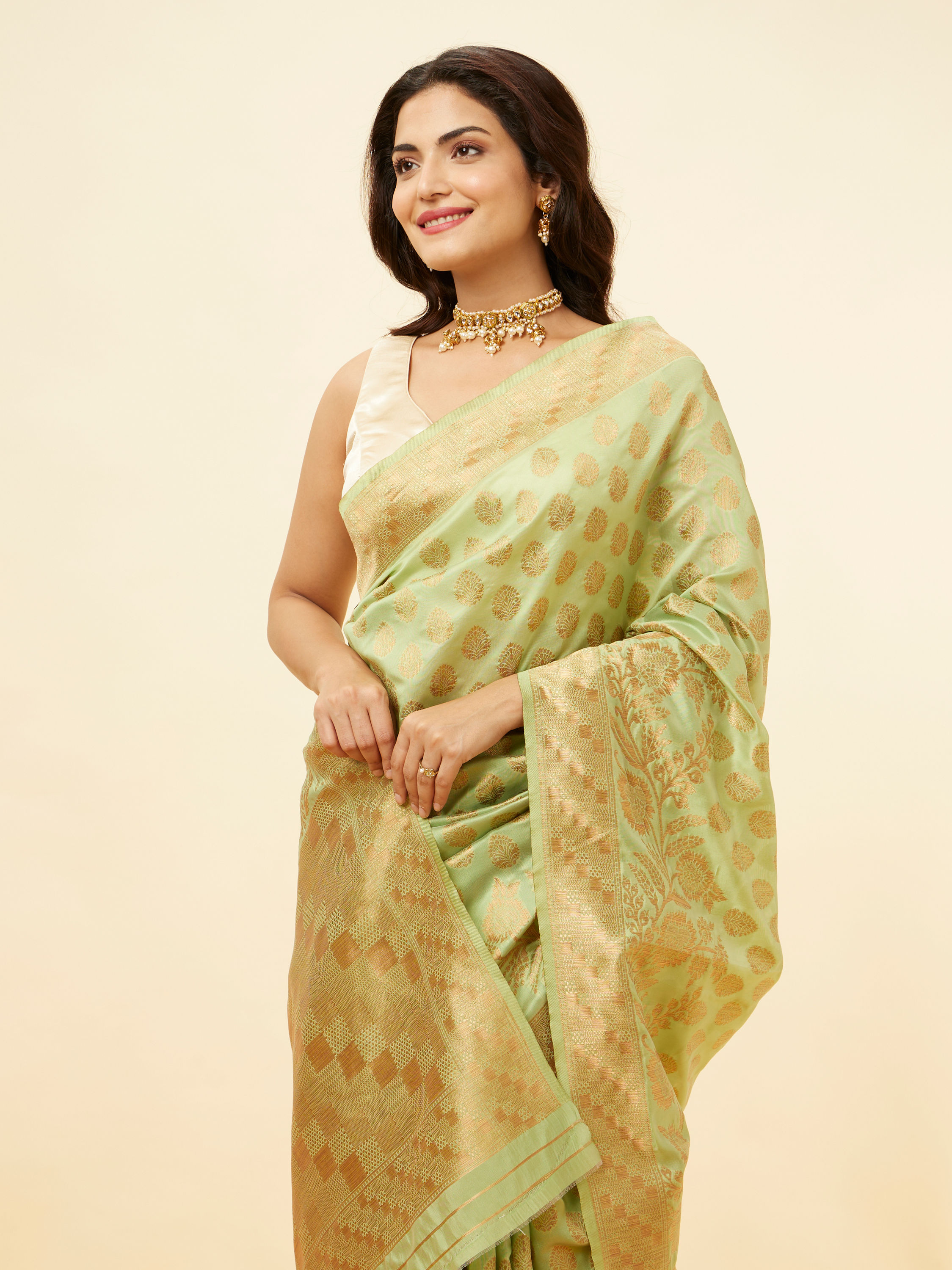 Mohey Women Pista Green Floral Zari Work Saree