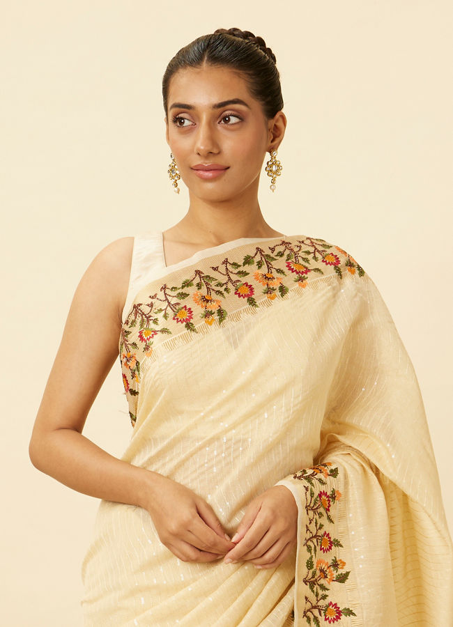 alt message - Mohey Women Ivory White Saree with Sequins and Patterned Borders image number 1