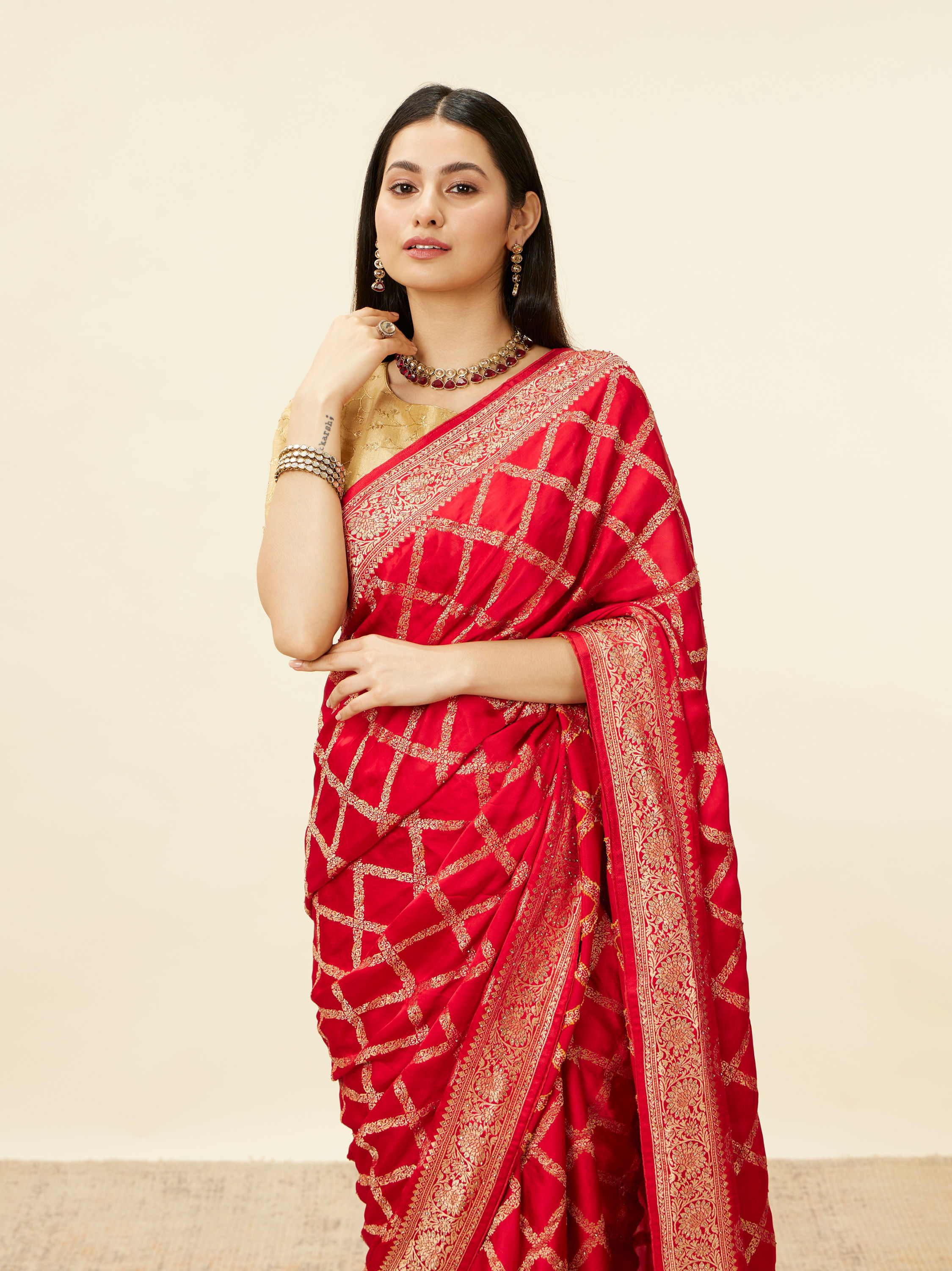 Mohey Women Tomato Red Grid Patterned Stone Work Saree