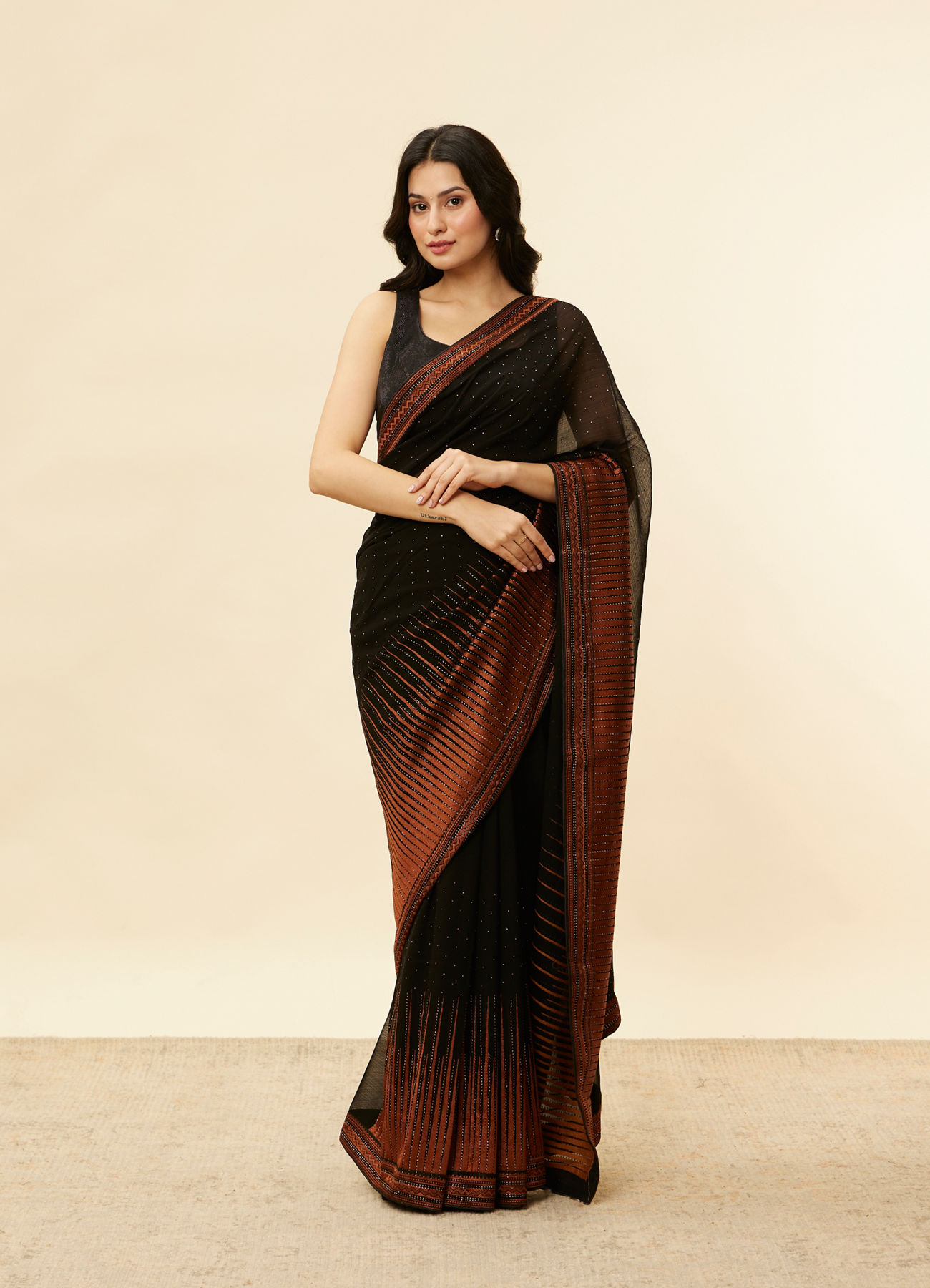 Mohey Women Kohl Black and Copper Stone Work Saree