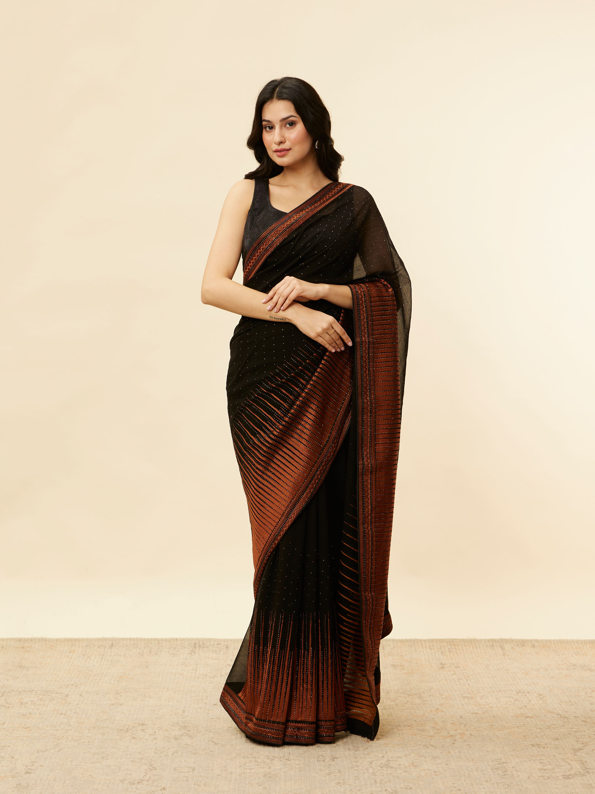 Mohey Women Kohl Black and Copper Stone Work Saree