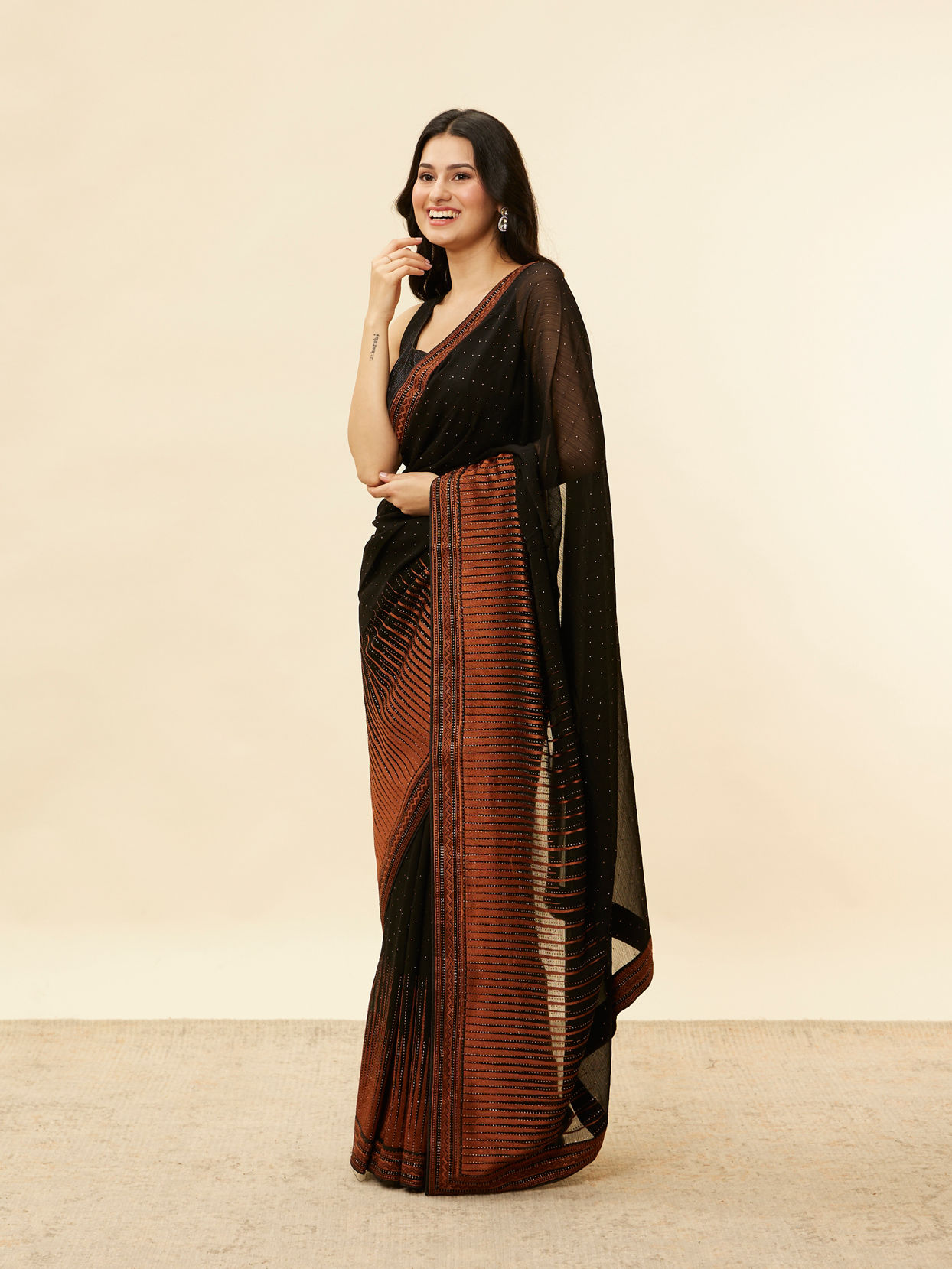 Mohey Women Kohl Black and Copper Stone Work Saree